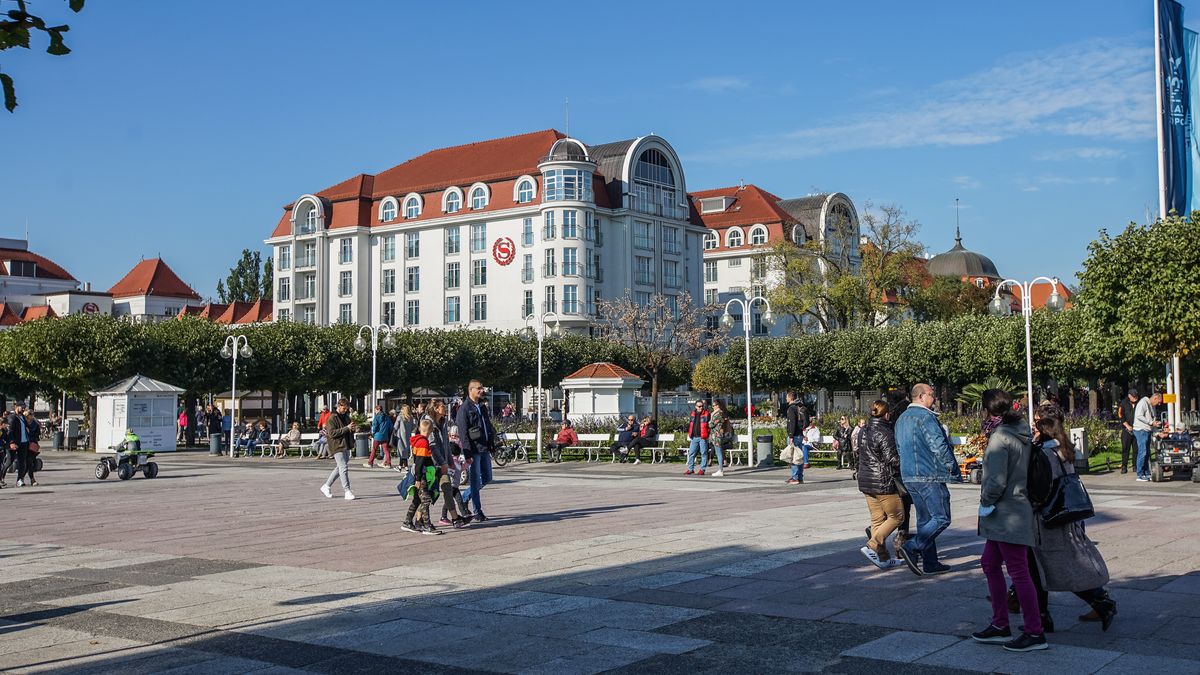 People enjoing sunny weather walking by the Baltic sea coast and Sopot pier are seen in Sopot, Poland on 10 October 2021 Sheraton hotel is seen (Photo by Michal Fludra/NurPhoto via Getty Images)
