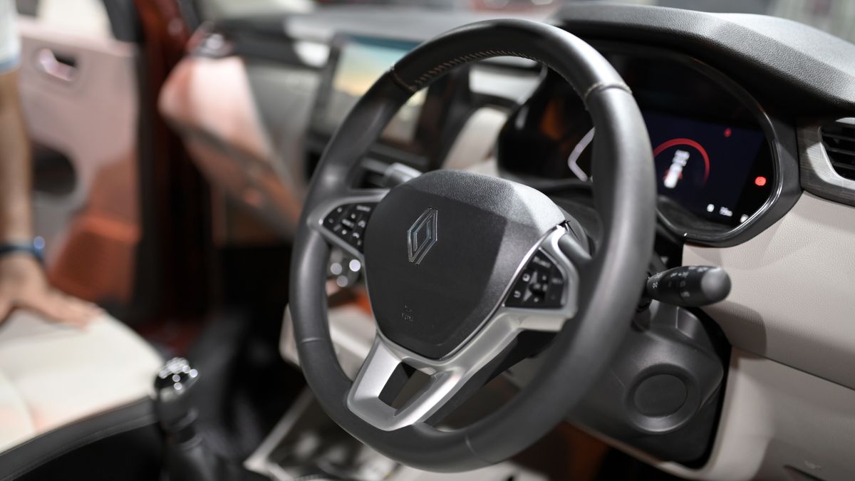 The Renault logo appears on the steering wheel of the new Renault Triber during its launch event in Mumbai, India, on July 23, 2025. The updated model is unveiled for India's compact MPV market. (Photo by Indranil Aditya/NurPhoto via Getty Images)