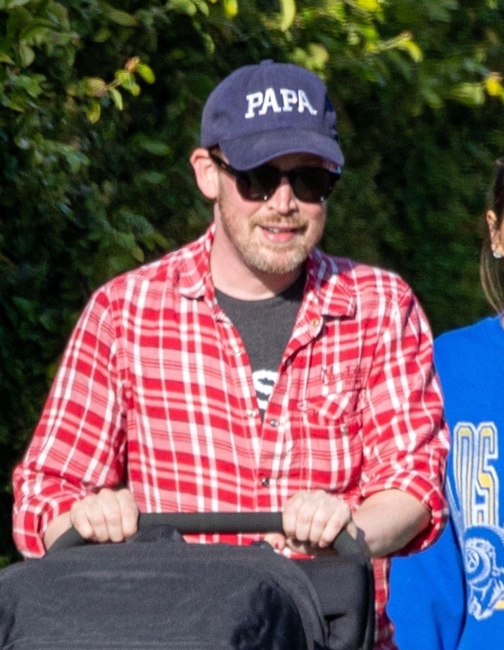 Macaulay Culkin on a family walk