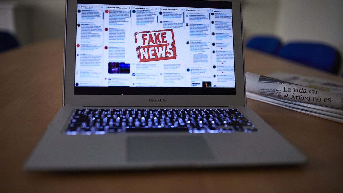 MADRID, SPAIN - NOVEMBER 06: In this photo illustration a person reads a fake news item on his laptop, on November 06, 2020 in Madrid, Spain. The government has approved an action procedure against so-called 'fake news' through which it will monitor the information and may request the collaboration of the media to pursue the "deliberate, large-scale and systematic dissemination of disinformation, which seeks to influence society for selfish and spurious purposes". (Photo illustration by Jesús Hellín/Europa Press via Getty Images)
