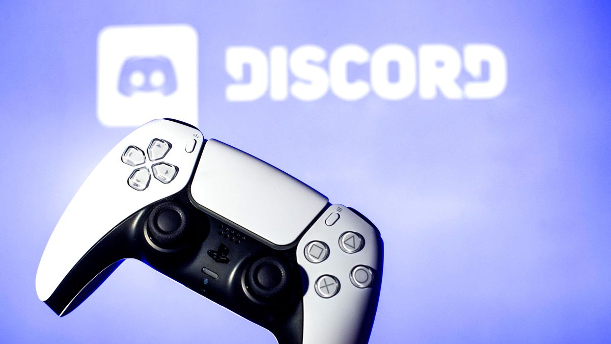 SPAIN - 2021/11/08: In this photo illustration, a PlayStation 5 controller seen with a Discord logo in the background. (Photo Illustration by Thiago Prudencio/SOPA Images/LightRocket via Getty Images)