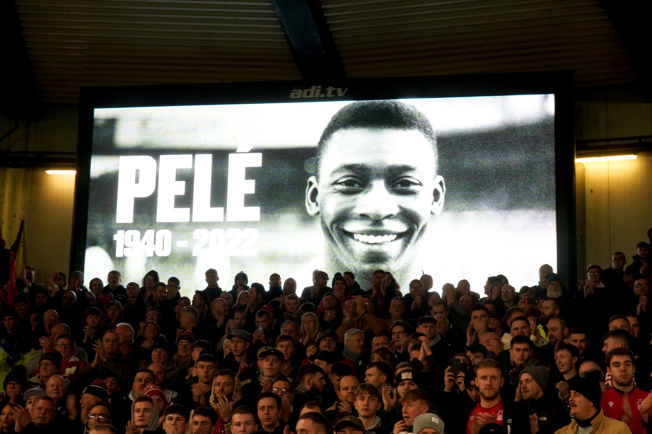 A tribute to Pele is shown on screen ahead of the Premier League match at the City Ground, Nottingham. Former Brazil player Pele died on Thursday in Brazil at the age of 82. Picture date: Sunday January 1, 2023. (Photo by Mike Egerton/PA Images via Getty Images)