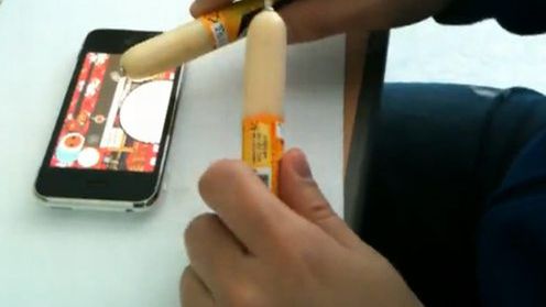 Koreańczycy używają kiełbasek do grania na iPhonie (wideo) 1