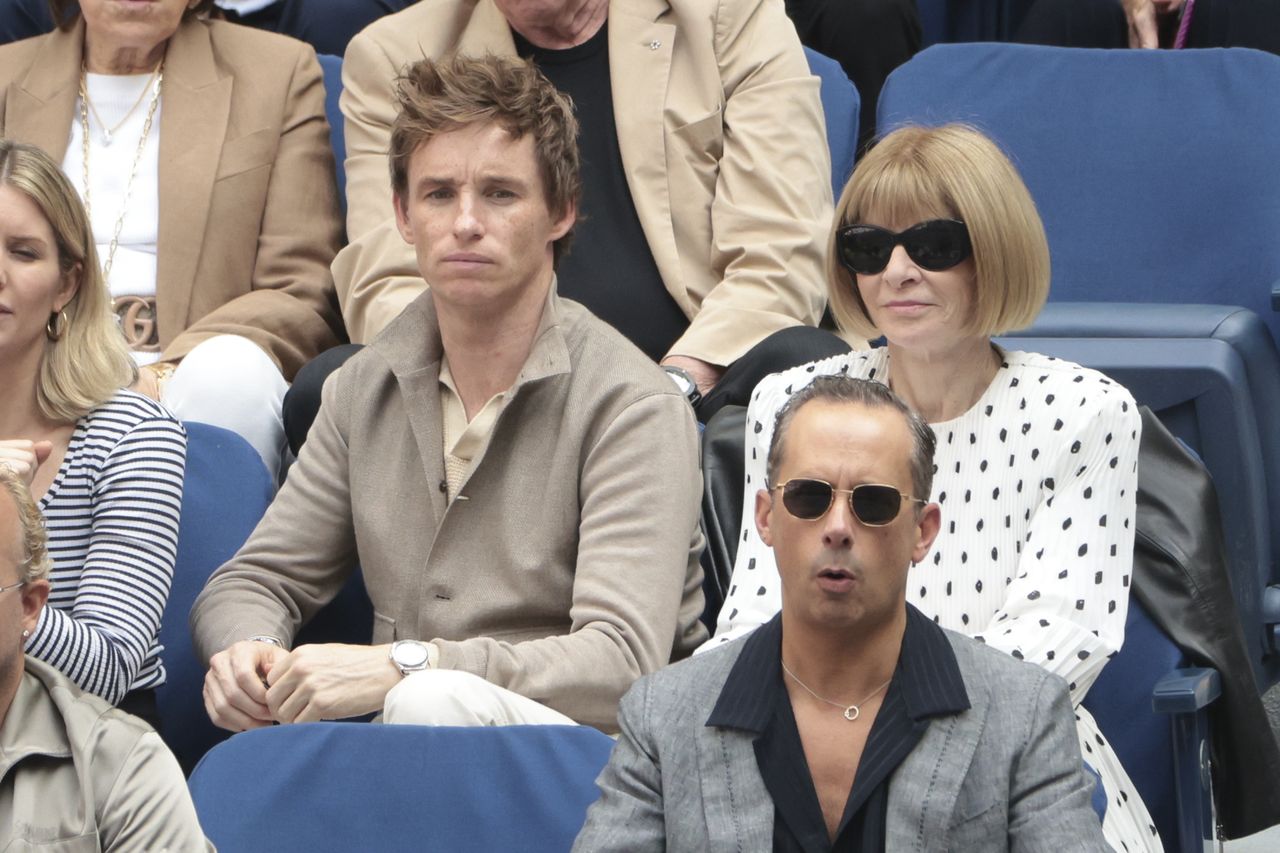 FNEW YORK, NEW YORK - SEPTEMBER 8: Eddie Redmayne and Anna Wintour attend the men's final on day fourteen of the 2024 US Open Tennis Championships at the USTA Billie Jean King Tennis Center on September 8, 2024 in Flushing Meadows, Queens, New York City. (Photo by Jean Catuffe/GC Images)