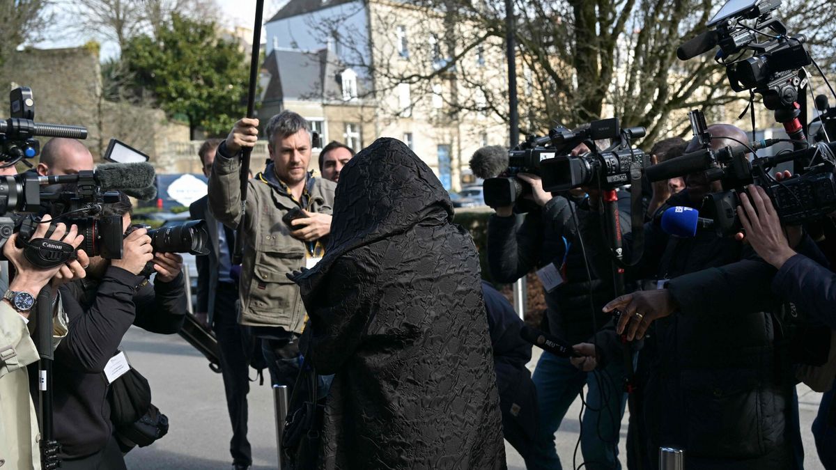 Temporary
Ex-wife of retired surgeon Joel Le Scouarnec, Marie-France Le Scouarnec (C), arrives for the trial of Joel Le Scouarnec on charges of assaulting or raping 299 patients at the Criminal Court in Vannes, western France, on February 25, 2025. Scouarnec, 74, faces a new four-month trial, charged with raping or sexually assaulting patients, most of them children and some of them unconscious at the time. He is already in jail after being found guilty in 2020 of abusing four children, including two of his nieces. (Photo by Damien MEYER / AFP)
DAMIEN MEYER