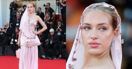 Caroline Derpienski w wielowarstwowej kreacji i osobliwym welonie pozuje na Festiwalu Filmowym w Wenecji