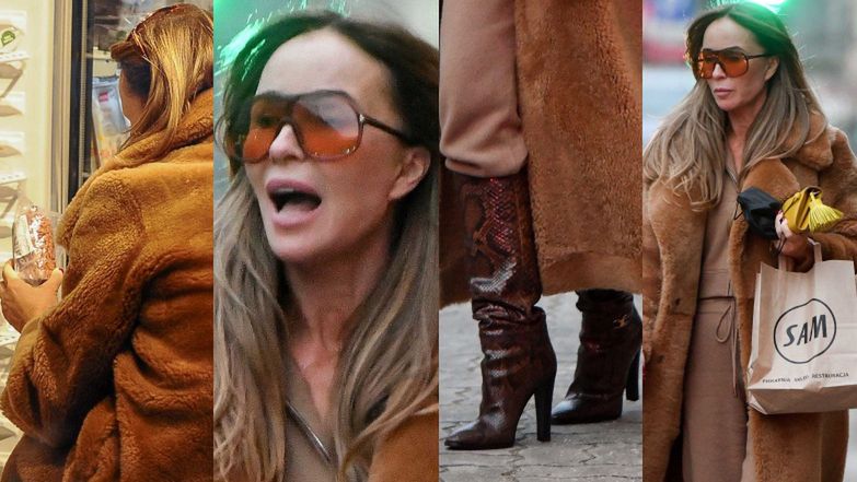 Wystrojona Joanna Przetakiewicz przeszukuje sklepową lodówkę w poszukiwaniu ulubionej kiełbasy