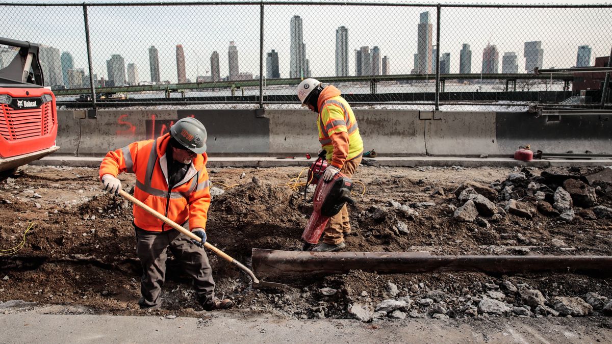 NEW YORK, NEW YORK - FEBRUARY 15: Construction workers fixe the street in front of the track where Freedom Plaza will be develop next to the United Nations on February 15, 2024 in New York City. The plan, from the Soloviev Group, would be for a massive entertainment district dubbed Freedom Plaza that would include a casino, hotel, shops, open space and over 500 units of affordable housing between 38th and 41st St. beside the FDR Drive (Photo by Kena Betancur/VIEWpress)