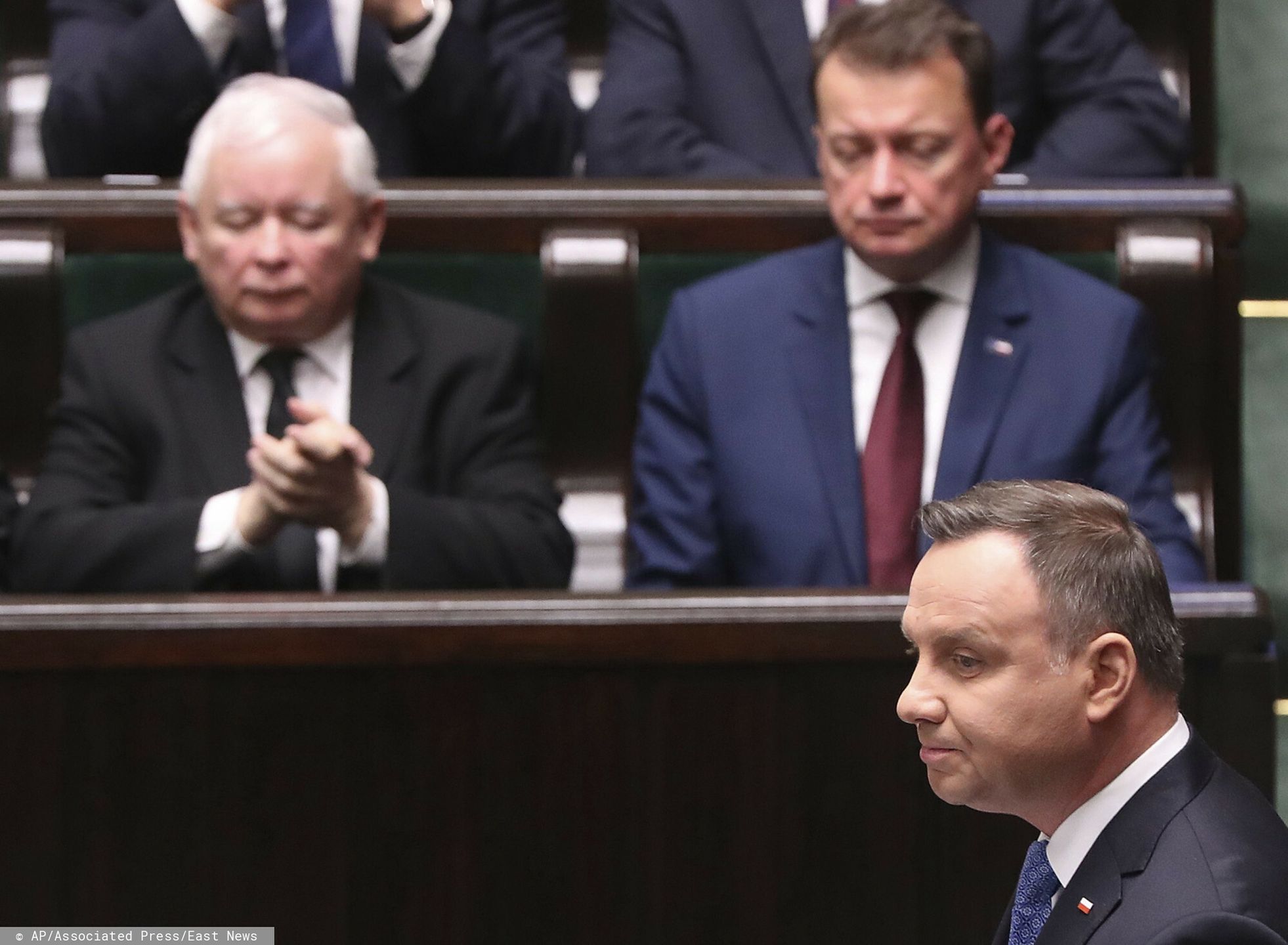 1. posiedzenie Sejmu IX kadencjiPoland's President Andrzej Duda, right, outlines his vision of a tolerant Poland based on Roman catholic values in a speech applauded by the populist ruling party leader Jaroslaw Kaczynski, center, at the gala inauguration of a new four-year term of the national parliament in Warsaw, Poland, Tuesday, Nov. 12, 2019. (AP Photo/Czarek Sokolowski)AP