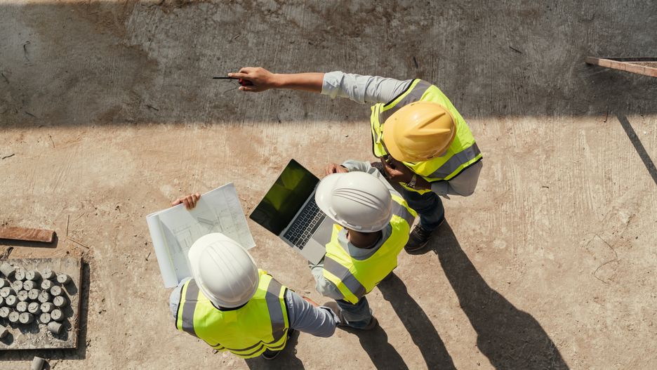 Top view, Team engineer building inspection use tablet computer and blueprint working at construction site. Civil Engineer, Contractor and Architect discussing in construction site.architect, architecture, asian, bim, blueprint, builder, building, business, cement, civil, civil engineer, computer, concrete, construction, contractor, development, discussion, employee, engineer, engineering, foreman, group, helmet, industrial, industry, inspection, inspector, job, labour, labtop, man, manager, meeting, people, plan, professional, project, renovate, safety, site, structure, team, teamwork, technical, technician, together, work, worker, workplace