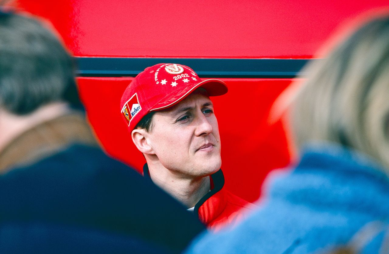 VALENCIA, SPAIN - FEBRUARY 01: Michael Schumacher of Germany and the Ferrari team talking to the media after pre-season testing at the Circuit Ricardo Tormo on February 1st, 2003 in Valencia, Spain. (Photo by Simon Bruty/Anychance/Getty Images)