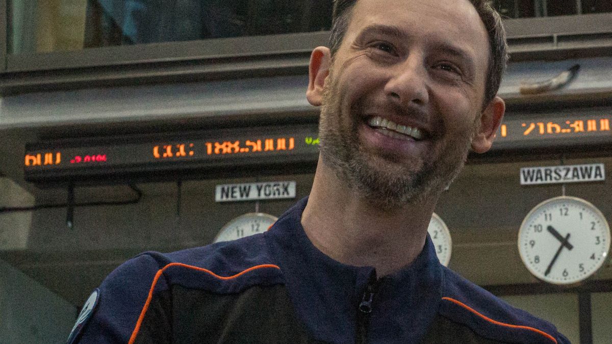 WARSAW, MAZOVIA, POLAND - 2025/02/10: In front of the Stock Exchange ticker, CEO of InPost Rafal Brzoska (R) poses with a crewmember of SpaceX's Axiom Mission-4, Slawosz Uznanski-Wisniewski (L). At the Stock Exchange, Polish Prime Minister Donald Tusk outlined Poland's development strategy for the coming year, promising 2025 would be a "long-awaited positive breakthrough." Joined by Finance Minister Andrzej Domanski, Tusk announced plans focusing on investments in science, energy transformation, modern technologies, port and railway development, a dynamic capital market, and strengthened business cooperation. (Photo by Neil Milton/SOPA Images/LightRocket via Getty Images)