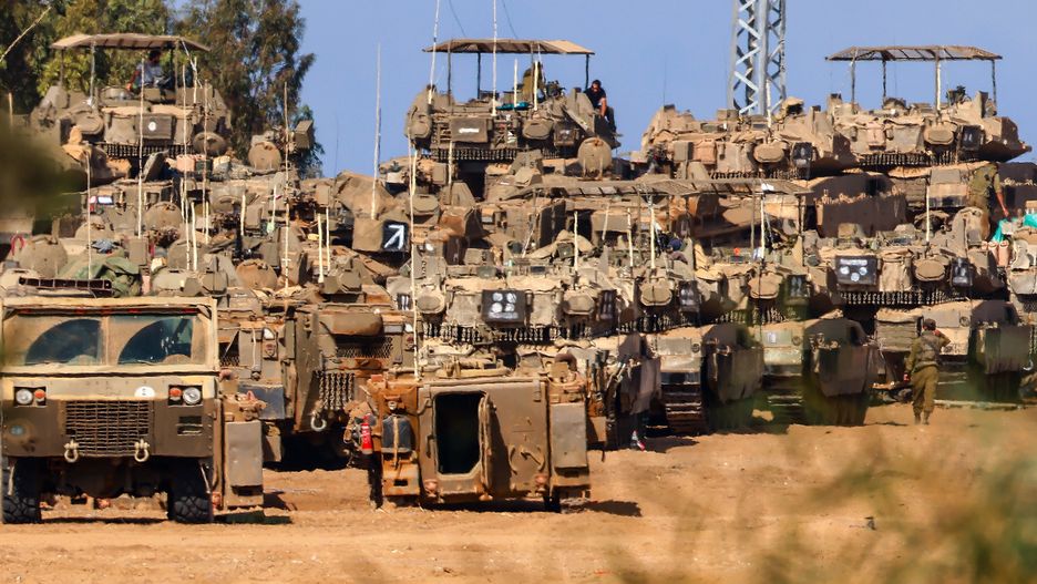 Israeli armored vehicles gathered at an undisclosed location near the border with Gaza, in Israel, 20 October 2023. More than 3,700 Palestinians and 1,400 Israelis have been killed according to the Israel Defense Forces (IDF) and the Palestinian Health authority since Hamas militants launched an attack against Israel from the Gaza Strip on 07 October. Israel has warned all citizens of the Gaza Strip to move to the south ahead of an expected invasion. EPA/HANNIBAL HANSCHKE Dostawca: PAP/EPA.
