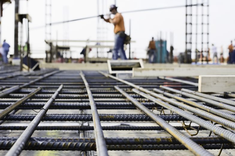 Ironworker prepping rebar for poued concrete floor
This rebar infrastructure will form the support for the concrete floor.  This high rise will eventually be 35 stories high; the picture was taken on the ninth floor.
Sean Justice
infrastructure, planning, construction, structure, teamwork