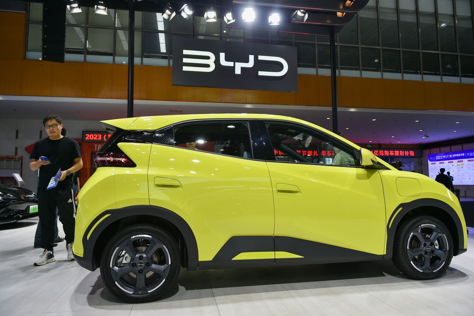 NANJING, CHINA - OCTOBER 4, 2023 - Visitors view a BYD new energy vehicle at the 2023 Nanjing International Auto Show in Nanjing, Jiangsu province, China, Oct 4, 2023. (Photo credit should read CFOTO/Future Publishing via Getty Images)