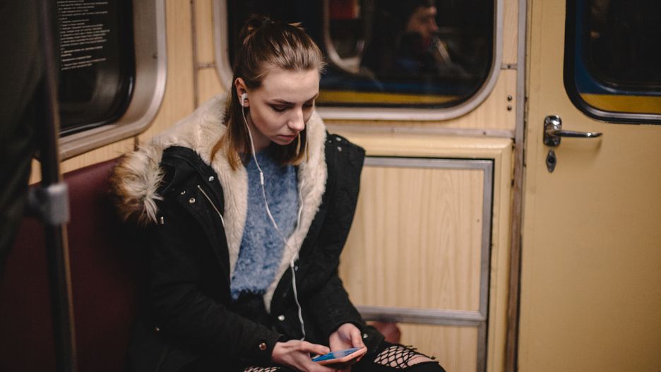 Young woman using smart phone while traveling in subway train
Cavan Images
anxious, commuting, girl, mobile, pretty, railway carriage, train, urban, using, young female