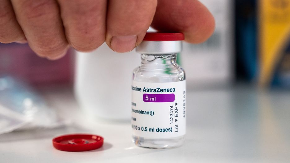 MADRID, SPAIN - 2021/04/09: A nurse showing a vial of AstraZeneca vaccine against coronavirus (COVID-19) during the first day of a mass vaccination for the population between 60 and 65 years in the Wizink Center. (Photo by Marcos del Mazo/LightRocket via Getty Images)