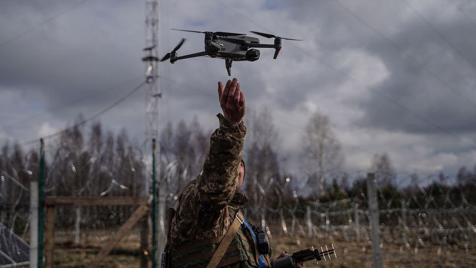 VOLYN OBLAST, UKRAINE - FEBRUARY 13: Ukrainian border guard launches drone during patrolling of the border with Belarus on February 13, 2024 in Volyn Oblast, Ukraine. Airspace monitoring is carried out with the help of unmanned aerial vehicles. Also border guards patrol the area on foot and in armored vehicles. (Photo by Yevhenii Vasyliev/Global Images Ukraine via Getty Images)