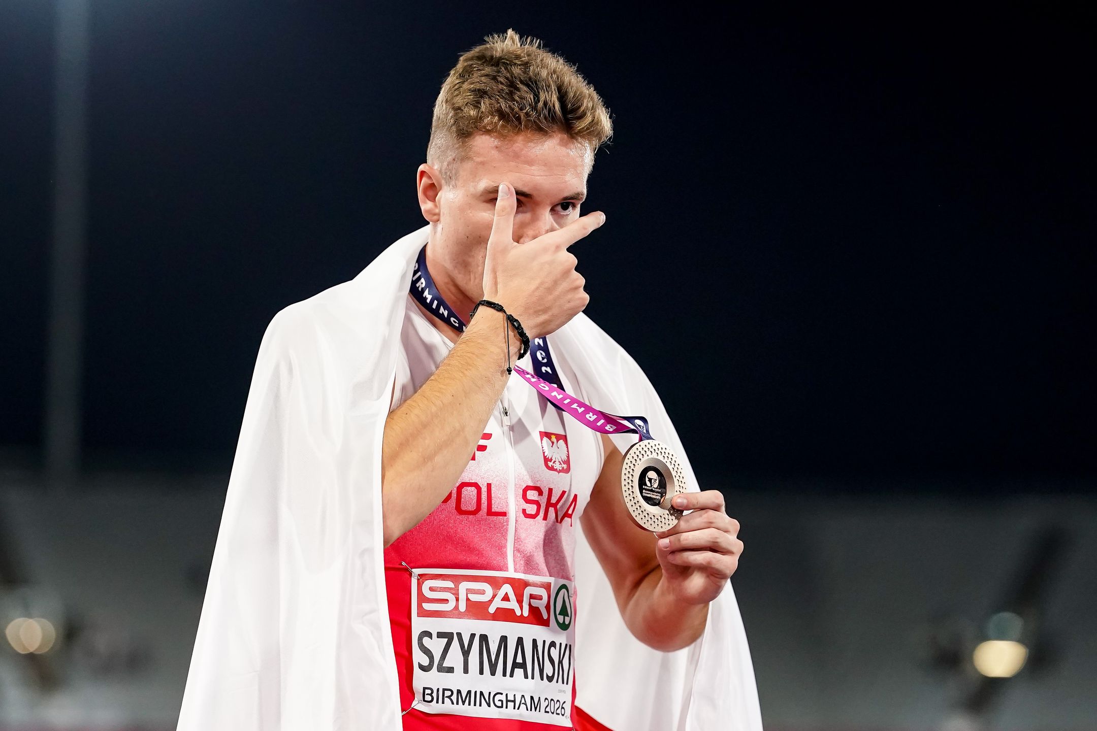 BIRMINGHAM, ENGLAND - AUGUST 12: Jakub Szymanski of Poland celebrates winning the bronze medal after the 110 m Hurdles Men during day three of the 27th European Athletics Championships at Alexander Stadium on August 12, 2026 in Birmingham, England. (Photo by Daniela Porcelli/Getty Images)