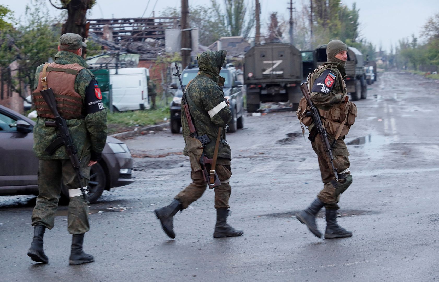 Service members of pro-Russian troops walk in Mariupol
Service members of pro-Russian troops walk across a road before the expected departure of Ukrainian soldiers, who surrendered at the besieged Azovstal steel mill, in the course of Ukraine-Russia conflict in Mariupol, Ukraine May 19, 2022.,Image: 692813261, License: Rights-managed, Restrictions: , Model Release: no, Credit line: ALEXANDER ERMOCHENKO / Reuters / Forum
ALEXANDER ERMOCHENKO / Reuters /
defence, civil unrest, war, category_code_def, category_code_europ, category_code_war, category_code_vio, category_code_defence, category_code_civil unrest
