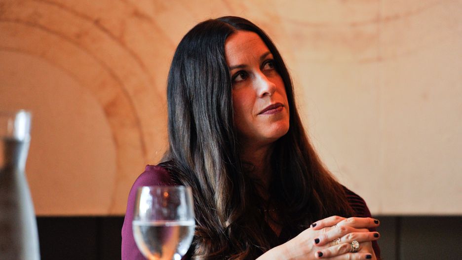 NAPA, CA - NOVEMBER 03: Alanis Morissette talks to the audience at the Trinchero family estates for her private Q&A event for Live In The Vineyard on November 3, 2012 in Napa, California. (Photo by Steve Jennings/WireImage)