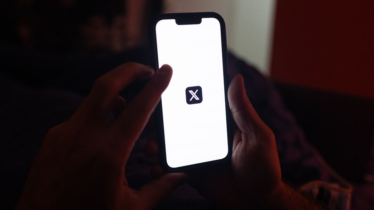 The logo of X, the social media platform formerly known as Twitter, displayed on a smartphone in Sao Paulo, Brazil, on Saturday, Aug. 31, 2024. Brazil's top court determined the immediate suspension of X in the country after its billionaire owner Elon Musk refused to name a legal representative for the social network in Latin America's largest nation. Photographer: Tuane Fernandes/Bloomberg via Getty Images
