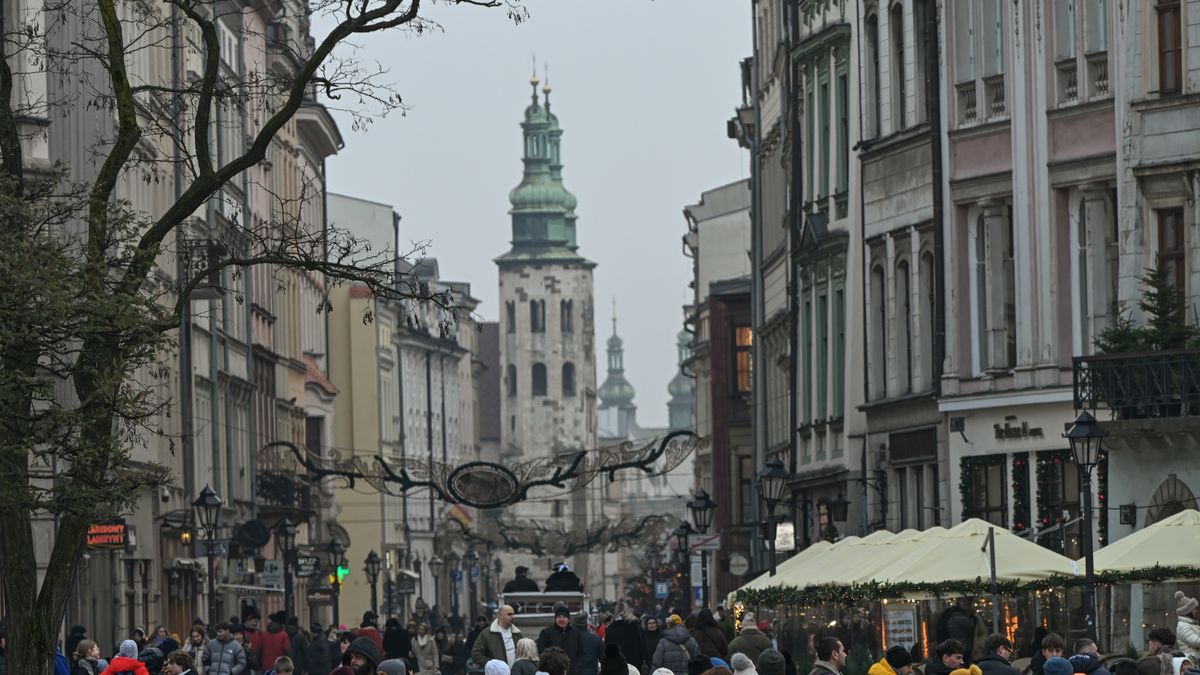 KRAKOW, POLAND  DECEMBER 2:A general view of Grodzka Street bustling with pedestrians in Krakow's Old Town, in Krakow, Poland, on December 2, 2025. (Photo by Artur Widak/NurPhoto via Getty Images)
