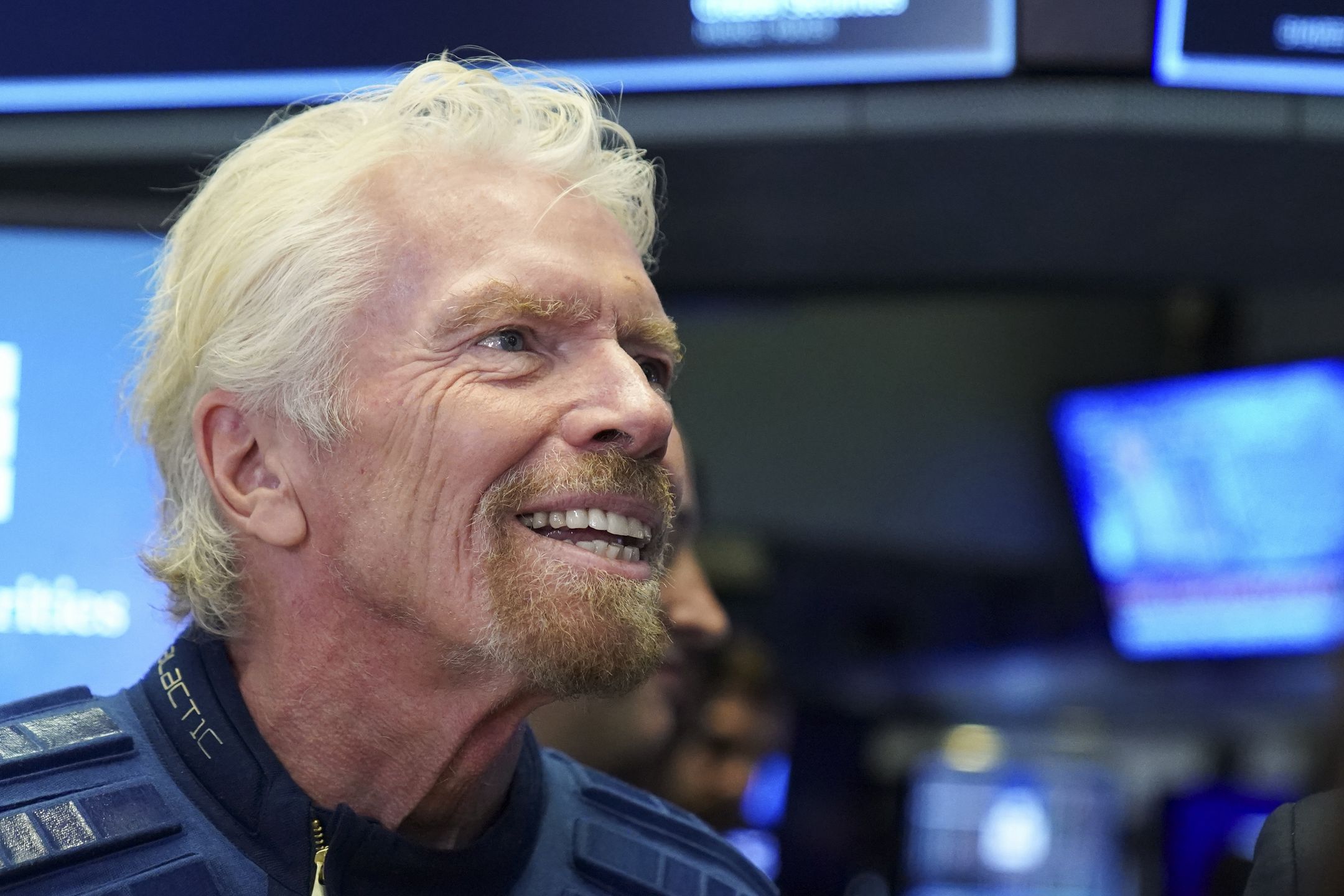 NEW YORK, NY - OCTOBER 28:  Sir Richard Branson, Founder of Virgin Galactic, looks on before ringing a ceremonial bell on the floor of the New York Stock Exchange (NYSE) to promote the first day of trading of Virgin Galactic Holdings shares on October 28, 2019 in New York City. Virgin Galactic Holdings became the first space-tourism company to go public as it began trading on Monday with a market value of about $1 billion. (Photo by Drew Angerer/Getty Images)