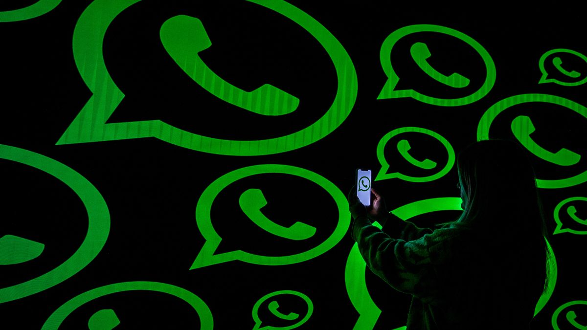 ANKARA, TURKIYE - DECEMBER 5: In this photo illustration, logos of WhatsApp are displayed on a mobile phone screen and computer screen Ankara, Turkiye on December 5, 2023. (Photo by Didem Mente/Anadolu via Getty Images)
