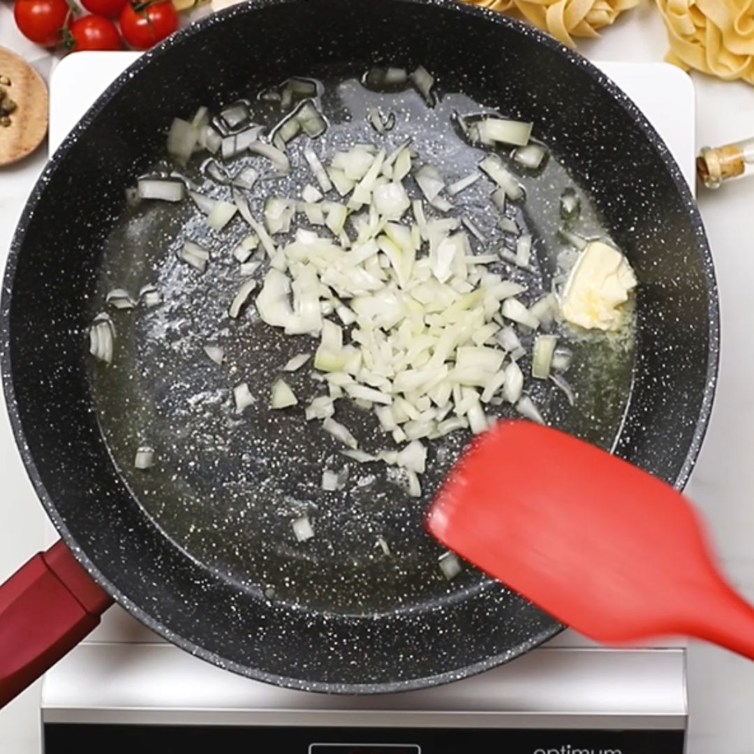 The first thing to go into the pan is the onion.