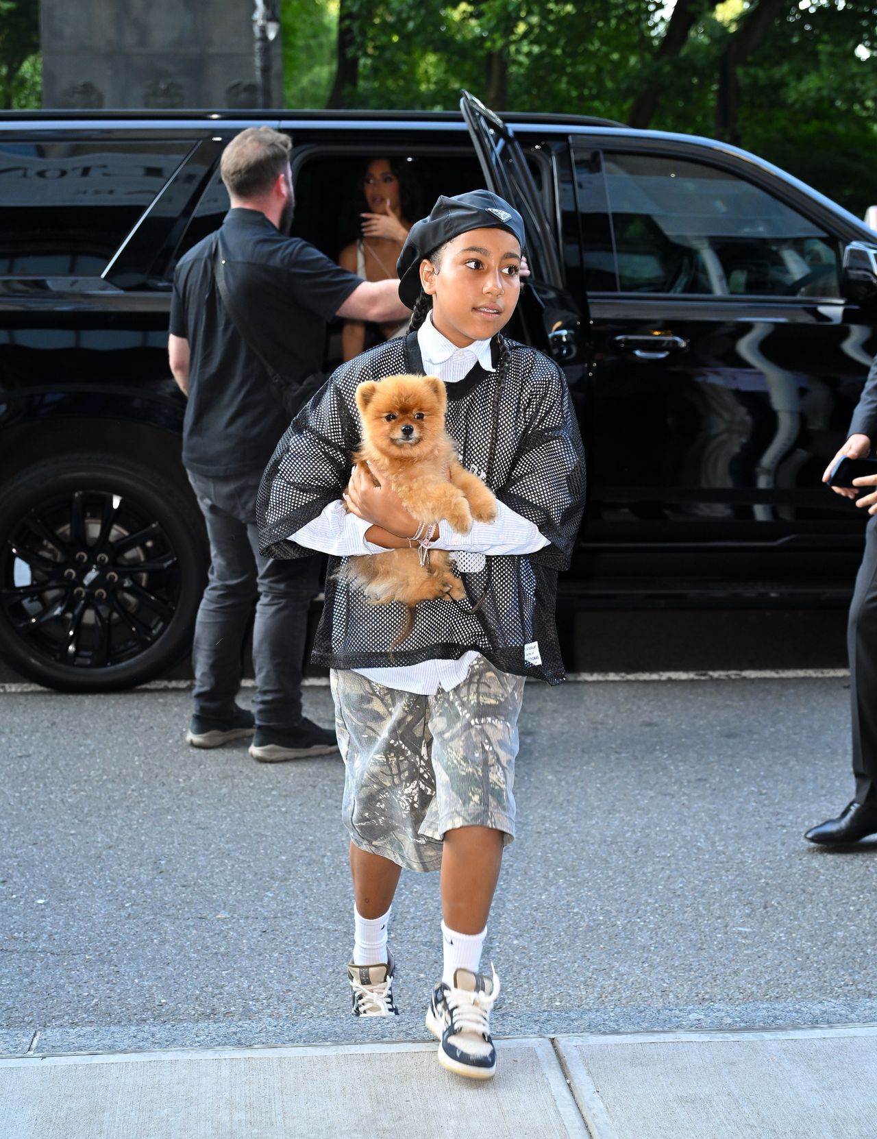 NEW YORK, NEW YORK - AUGUST 14: North West and Kim Kardashian are seen on the streets of Midtown Manhattan on August 14, 2024 in New York City. (Photo by James Devaney/GC Images)