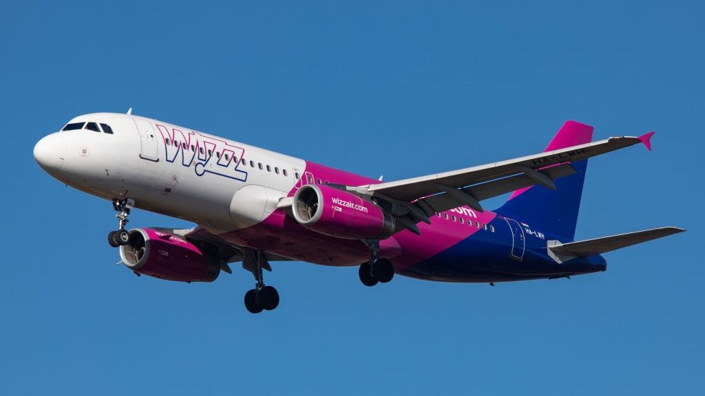 Wizz Air Airbus A320Airbus A320 ( A320-232) aircraft of the low cost airline Wizz Air ( W6 ) with registration landing at Eindhoven EIN EHEH international airport in The Netherlands during the day with nice weather and blue sky.  WizzAir is a budget European airline with headquarters in Budapest, Hungary. (Photo by Nicolas Economou/NurPhoto via Getty Images)NurPhoto320, A320, Air, Airbus, Airbus A320, Airport, Aviation, Cockpit, EHEH, EU, Eindhoven, Europe, Flight, Fly, Technology, Travel, V2500, W6, WZZ, aircraft, airliner, airplane, apporach, approaching, arrive, arriving, blue, budapest, budget, cost, day, economy, ein, engine, engines, flying, fuselage, ha-lwh, holidays, hungary, iae, jet, jetliner, landing, logo, low, low-cost, modern, paint, passenger, runway, scheme, sky, summer, tourist, trademark, transportation, v2527-a5, vacation, website, wheels, wings, wizz, wizzair