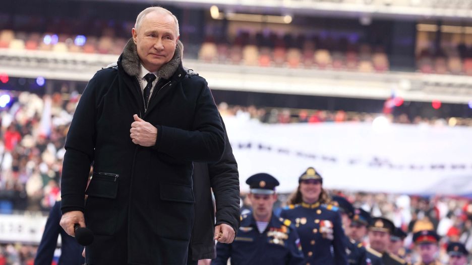 MOSCOW, RUSSIA - FEBRUARY 22: (----EDITORIAL USE ONLY - MANDATORY CREDIT - 'KREMLIN PRESS OFFICE / HANDOUT' - NO MARKETING NO ADVERTISING CAMPAIGNS - DISTRIBUTED AS A SERVICE TO CLIENTS----) Russian President Vladimir Putin attends a meeting at the Luzhniki Stadium in Moscow, Russia on February 22, 2023. (Photo by Kremlin Press Office/Handout/Anadolu Agency via Getty Images)