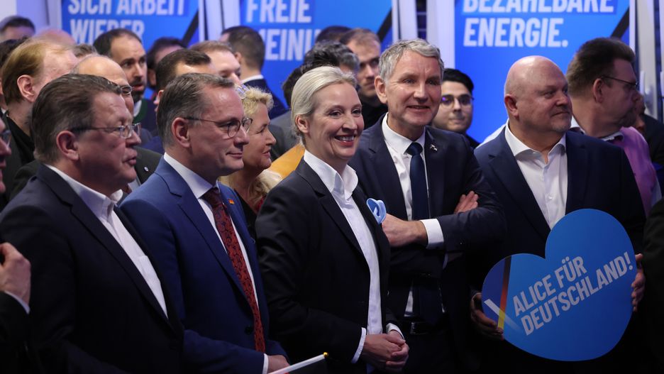 BERLIN, GERMANY - FEBRUARY 23: Alice Weidel (C), co-leader and chancellor candidate of the far-right Alternative for Germany (AfD), AfD co-leader Tino Chrupalla (C-L), Thuringia AfD leader Bjoern Hoecke (C-R) and AfD leading member Stephan Brandner (L) wait at AfD headquarters for the announcement of initial results in snap federal parliamentary elections on February 23, 2025 in Berlin, Germany. Germany is holding elections today following the collapse of the three-party government coalition last November. (Photo by Sean Gallup/Getty Images)