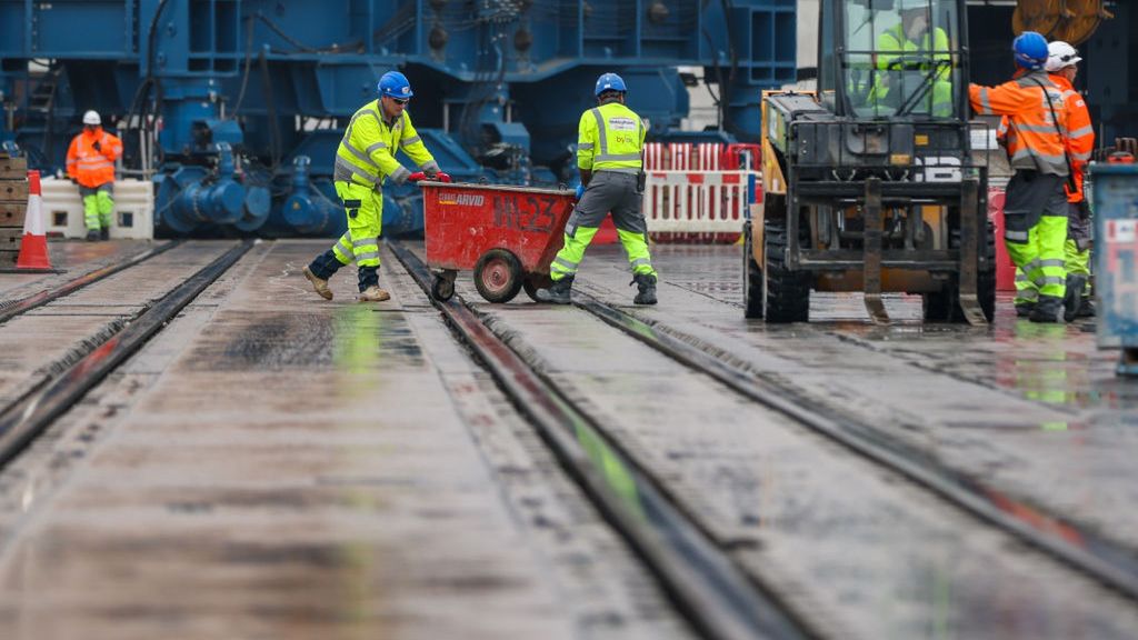 Inside The Construction Site Of Hinkley Point C Nuclear Power Station
Contractors work at Hinkley Point C nuclear power station construction site in Bridgwater, UK, on Wednesday, July 20, 2022. The two reactors are supposed to be blazing a trail for a nuclear renaissance in Britain, as the government seeks to boost the countrys energy independence and reduce its reliance on fossil fuels. Photographer: Hollie Adams/Bloomberg via Getty Images
Bloomberg
construction workers, british, heavy construction, nuclear power, business news, emea, electricity production, distribution, energy, natural resources, construction, development, industries, utilities