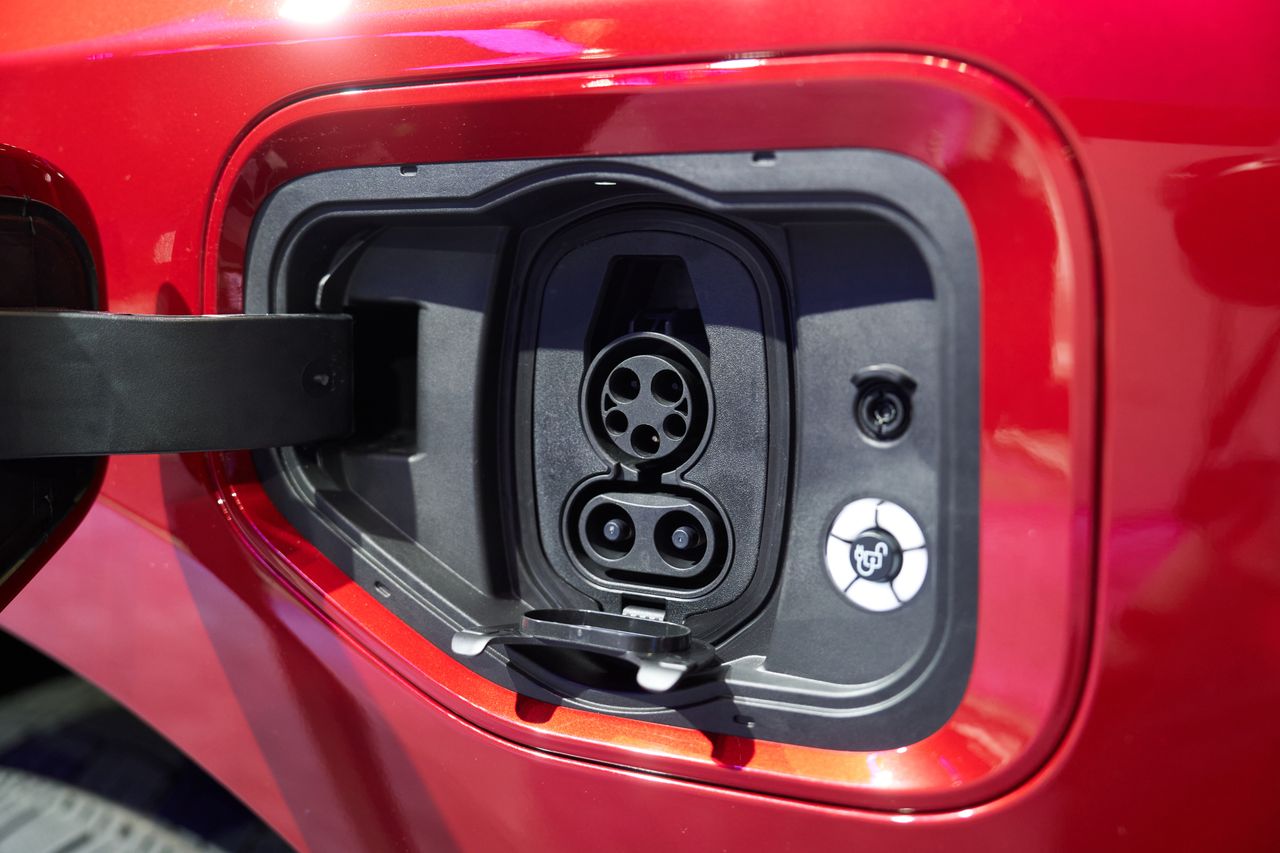 A J1772 electric vehicle (EV) charging port on a 2024 Ford F-150 Lightning Platinum electric pickup truck during the 2024 New York International Auto Show (NYIAS) in New York, US, on Thursday, March 28, 2024. The event, which first opened in November 1900, is North America's oldest and largest attended auto show. Photographer: Bing Guan/Bloomberg via Getty Images