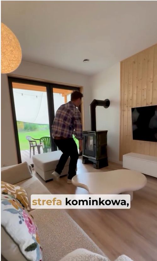 Mikołaj Roznerski - salon i kominek