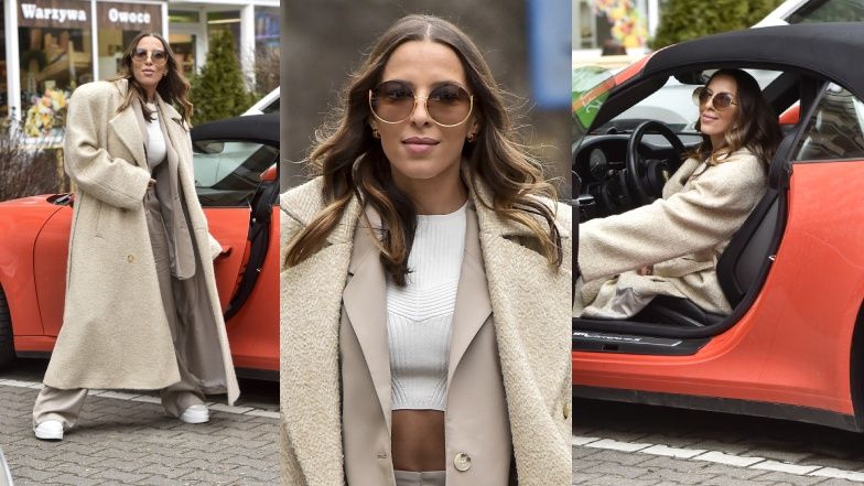 Ewa Chodakowska z GOŁYM BRZUCHEM opuszcza gmach "Dzień dobry TVN" i zmierza do wartego 700 tysięcy złotych porsche (ZDJĘCIA)