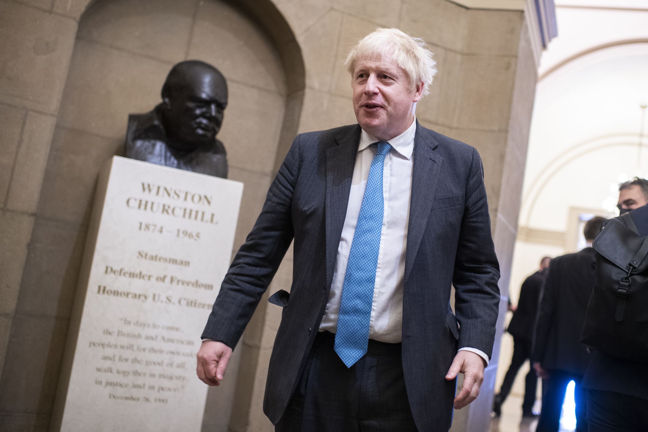 UNITED STATES - SEPTEMBER 22: British Prime Minister Boris Johnson checks out a bust of Sir Winston Churchill  after a meeting with Speaker of the House Nancy Pelosi, D-Calif., in the U.S. Capitol on Wednesday, September 22, 2021. (Photo By Tom Williams/CQ-Roll Call, Inc via Getty Images)