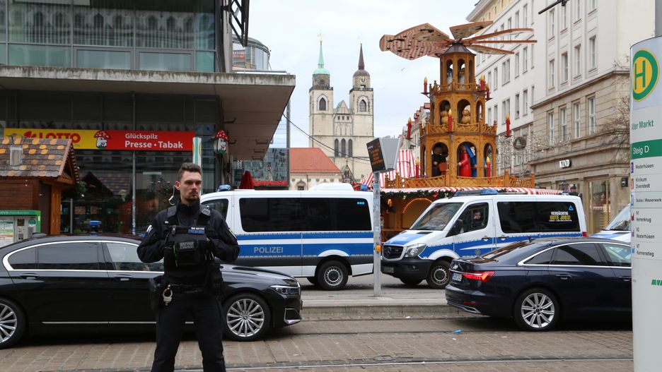 MAGDEBURG, GERMANY - DECEMBER 21: Police officers take measures as German Chancellor Olaf Scholz visits the Christmas market after a car drove into the crowd in Magdeburg, Germany, on December 21, 2024. The death toll from the deadly car attack at a Christmas market in the German city of Magdeburg rose to four, and over 200 others have been injured, local media reported on Saturday. (Photo by Somaya Abdelrahman/Anadolu via Getty Images)