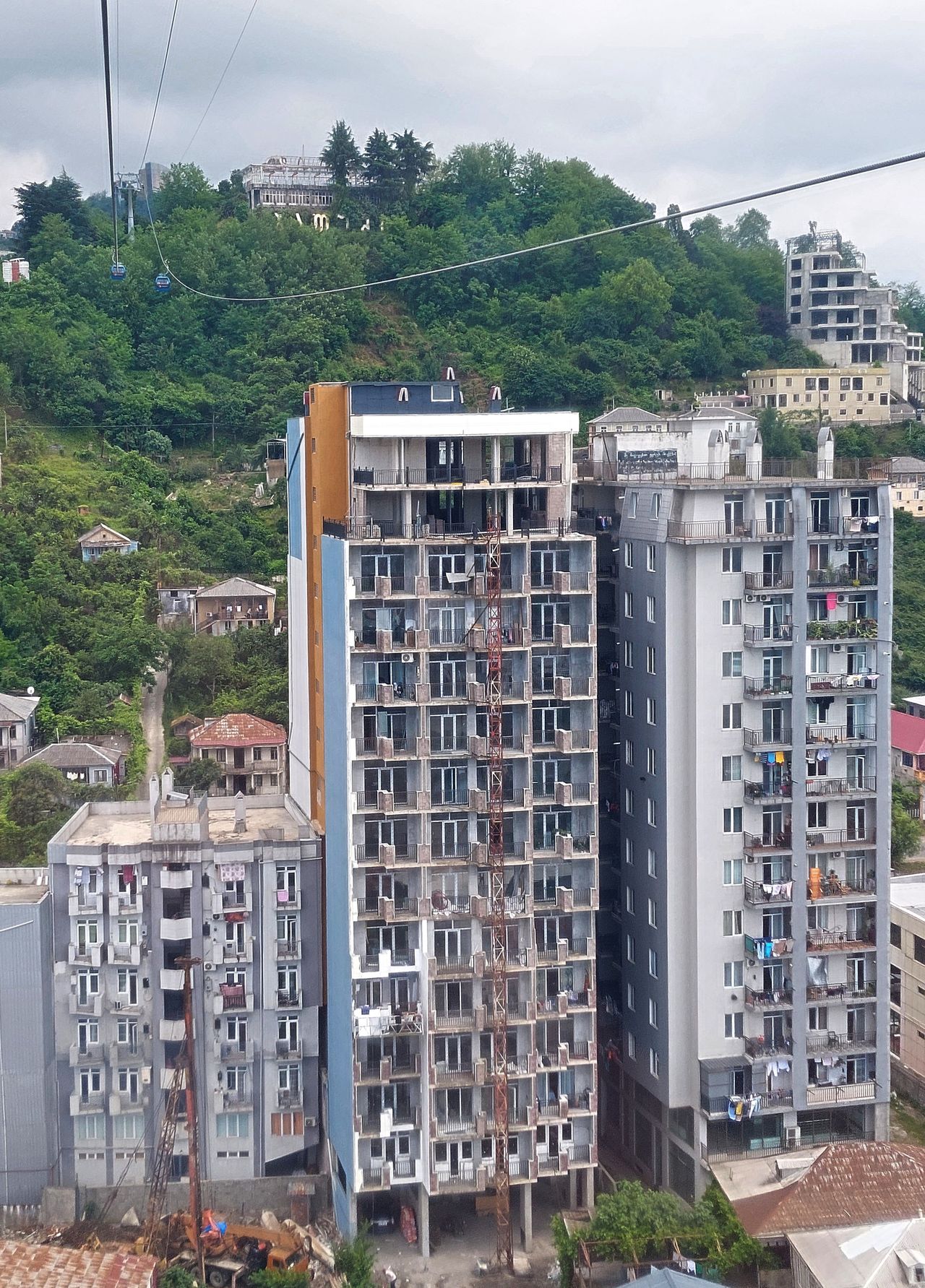 New buildings are being built right next to each other.