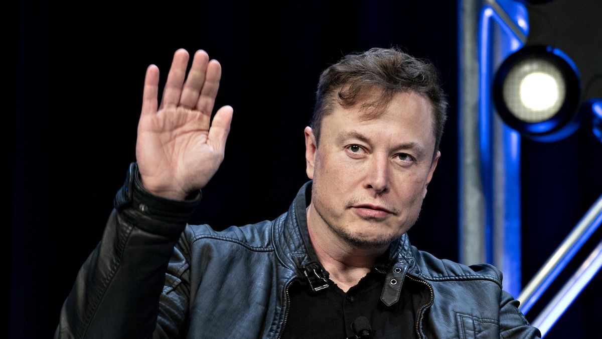 Elon Musk, founder of SpaceX and chief executive officer of Tesla Inc., waves while arriving to a discussion at the Satellite 2020 Conference in Washington, D.C., U.S., on Monday, March 9, 2020. The event comprises important topics facing both satellite industry and end-users, and brings together a diverse group of thought leaders to share their knowledge. Photographer: Andrew Harrer/Bloomberg via Getty Images