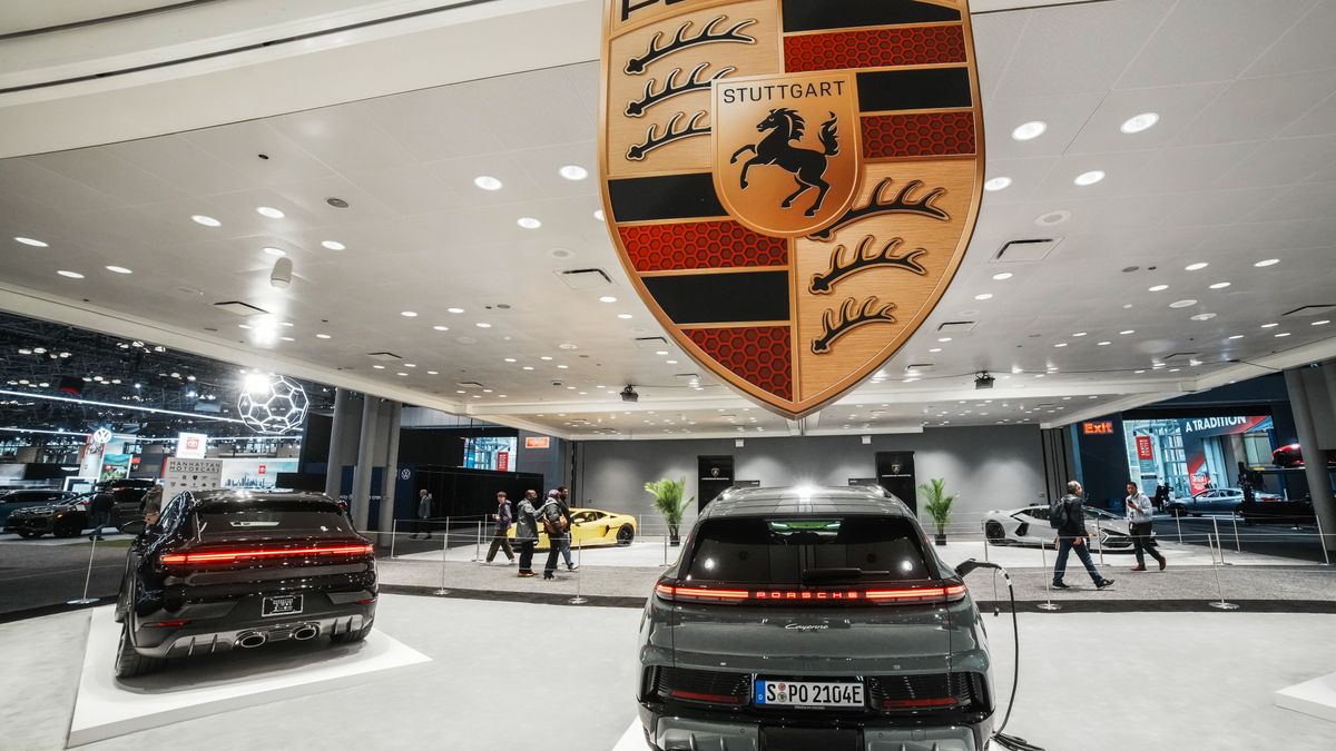 NEW YORK, NEW YORK - APRIL 02: People visit the car manufacturer Porsche stand at the New York Auto Show media day at the Jacob K. Javits Convention Center on April 02, 2026 in New York City. The 126th New York International Auto Show will have over 30 automotive manufacturers and around 700 cars, trucks and SUVs from mainstream, luxury and supercar brands. (Photo by Zamek/VIEWpress)