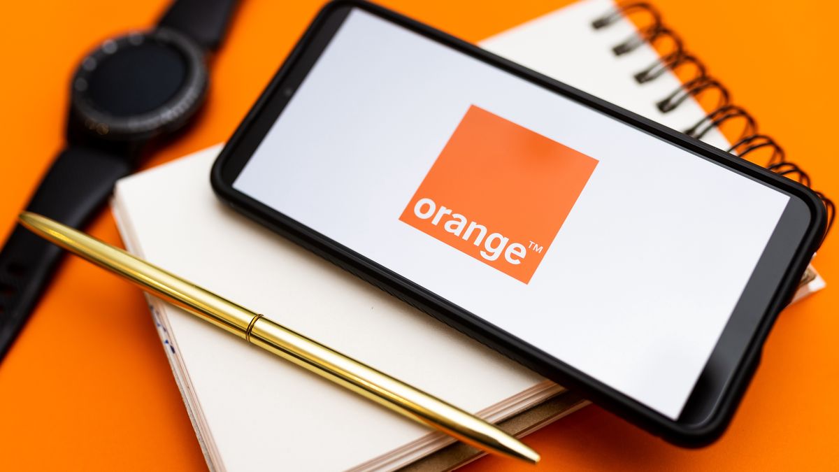 POLAND - 2022/12/07: In this photo illustration an Orange logo seen displayed on a smartphone. (Photo Illustration by Mateusz Slodkowski/SOPA Images/LightRocket via Getty Images)