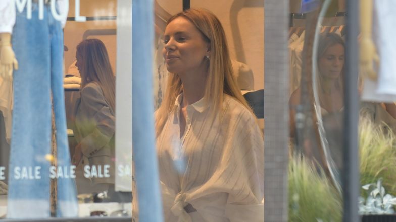 Izabela Janachowska pozuje przed butikiem Łukasza Jemioła