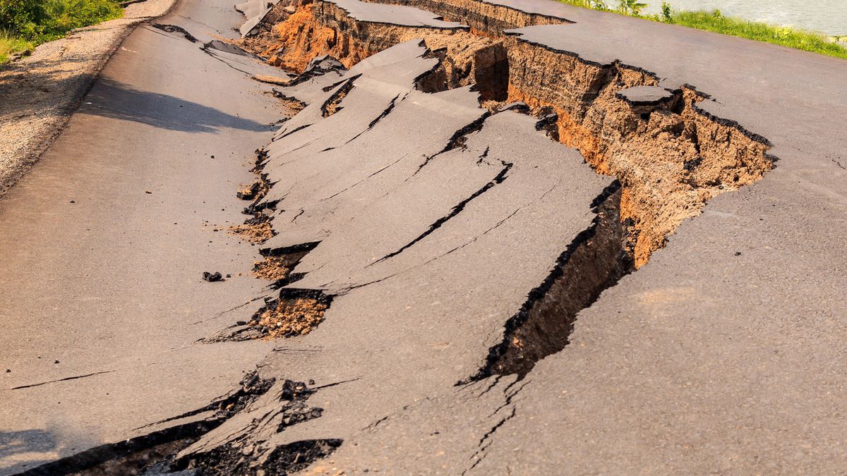 Cracked of asphalt road after the earthquake