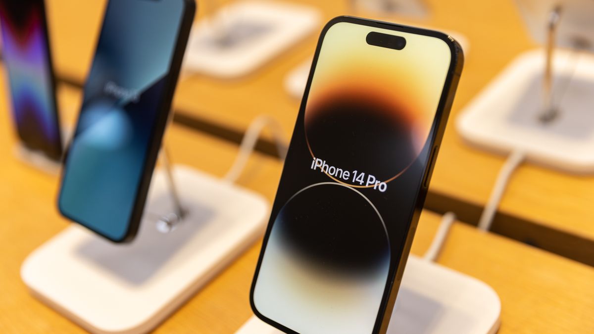 The Apple iPhone 14 Pro on sale at the company's Fifth Avenue store in New York, US, on Friday, Sept. 16, 2022. The latest iPhone hits stores Friday, and Apple Inc. is counting on well-heeled shoppers to make the device a hit during a year of roaring inflation and shaky technology spending. Photographer: Jeenah Moon/Bloomberg via Getty Images