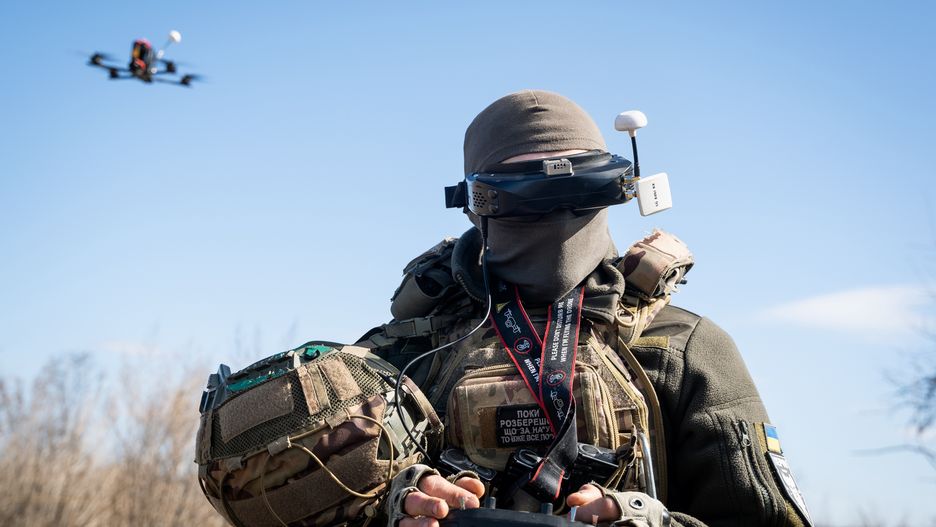 A Ukrainian soldier performs a trial with an FPV drone in the region of Kharkiv, Ukraine, on March 19, 2025. (Photo by Alfons Cabrera/NurPhoto via Getty Images)