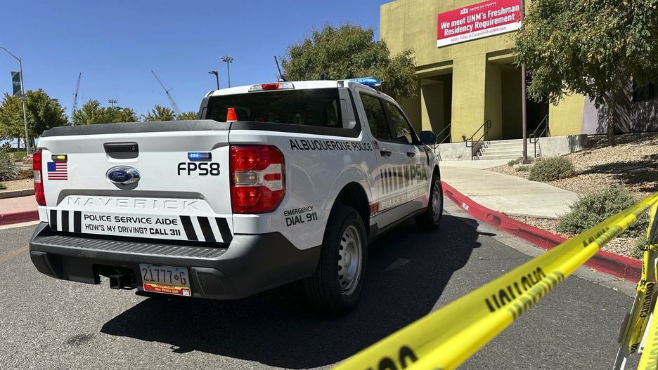 Temporary
Authorities block access to an area on the University of New Mexico campus near the student housing complex where two people were shot in the early morning hours in Albuquerque, N.M., on Friday, July 25, 2025. (AP Photo/Susan Montoya Bryan)
Susan Montoya Bryan
