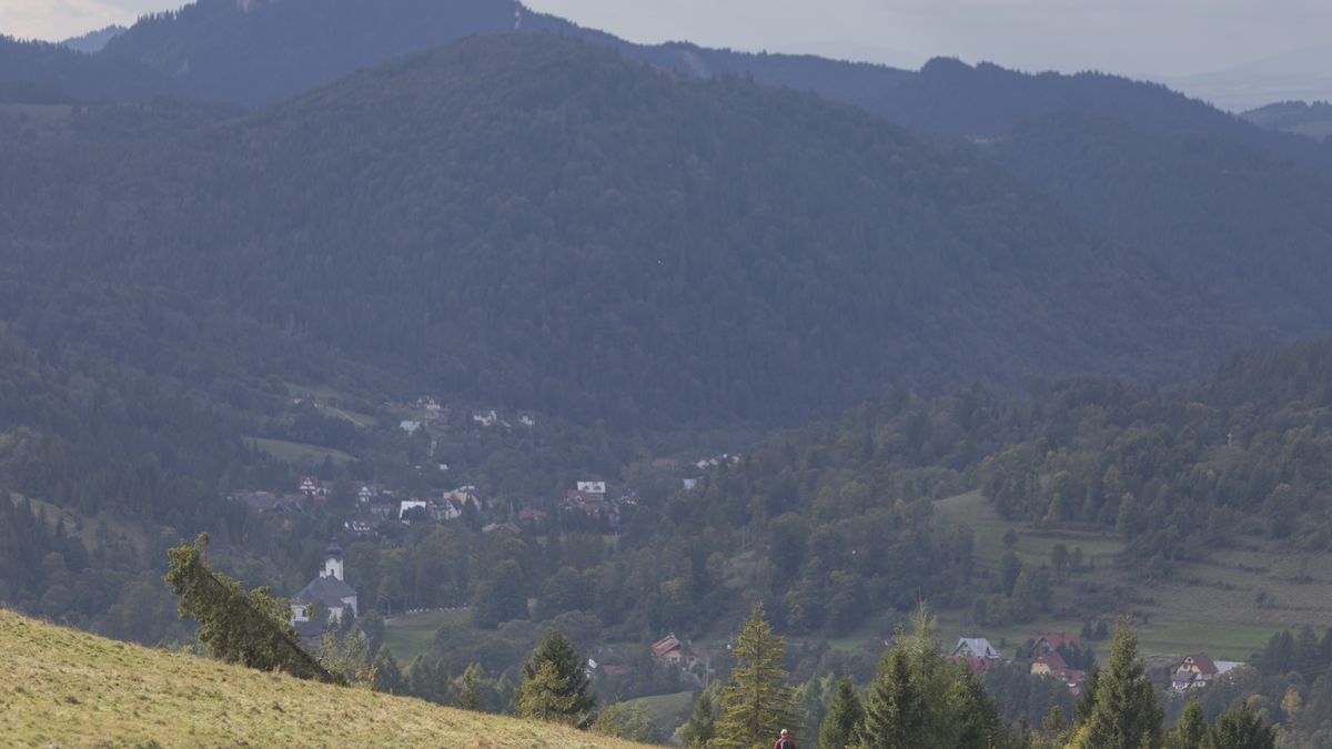 A single hiker descends from the tops of southern Polish mountains, on 20th September 2019, Biala Woda, Jaworki, near Szczawnica, Malopolska, Poland. (Photo by Richard Baker / In Pictures via Getty Images)